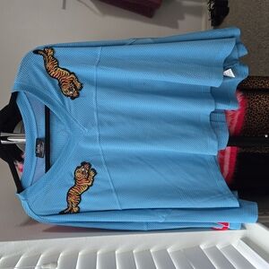 Dressed in LALA Blue Jersey Top with Tiger Patches